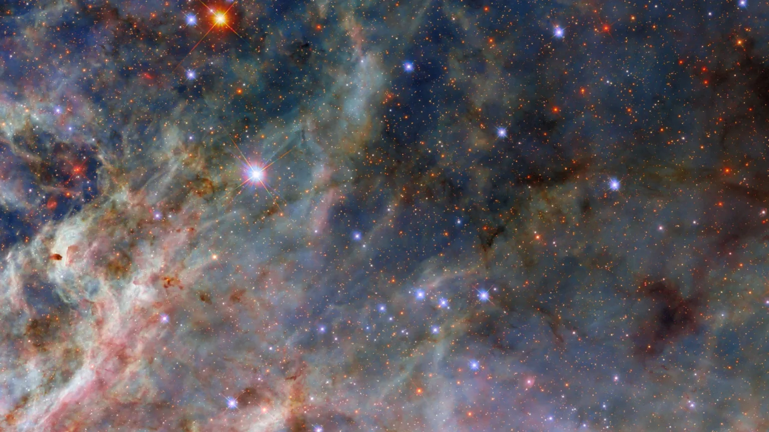 Hubble captura uma tempestade intensa de formação estelar a 160.000 anos-luz de distância